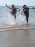 Viv and Liv splashing in sea
